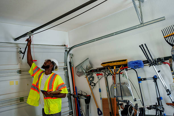 Professional Garage Door Maintenance technician working in La Monte, MO